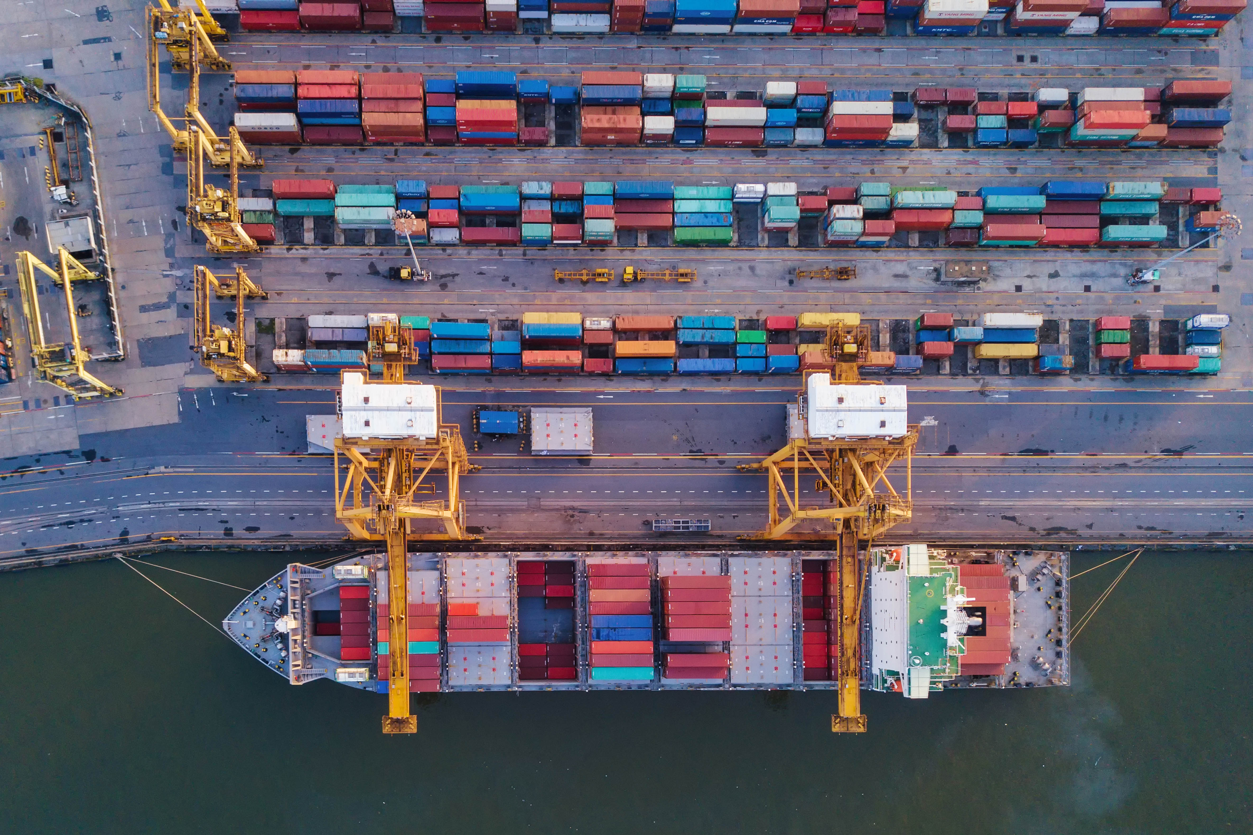 Coal Production, Cranes And Coal Loading At The Port Terminal. Industrial Port Terminal.